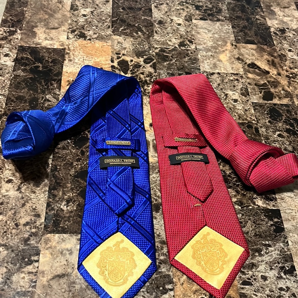 One red and one blue necktie . Good condition.